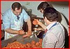 Peppinello, Eugenio e Giglietto preparando i salami.jpg