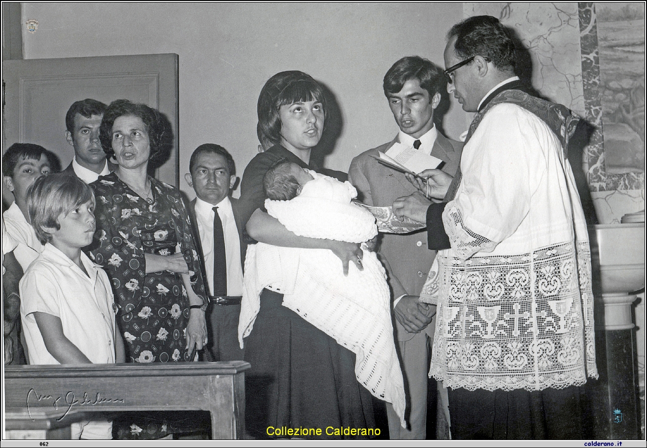 Padre Romualdo e il battesimo com Maria Di Puglia e Gianfranco D'Alascio.jpeg