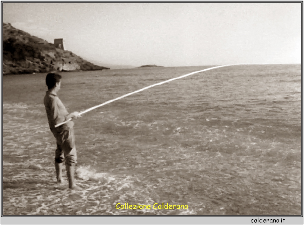 Pescatore sulla spiaggia del Porto.jpg